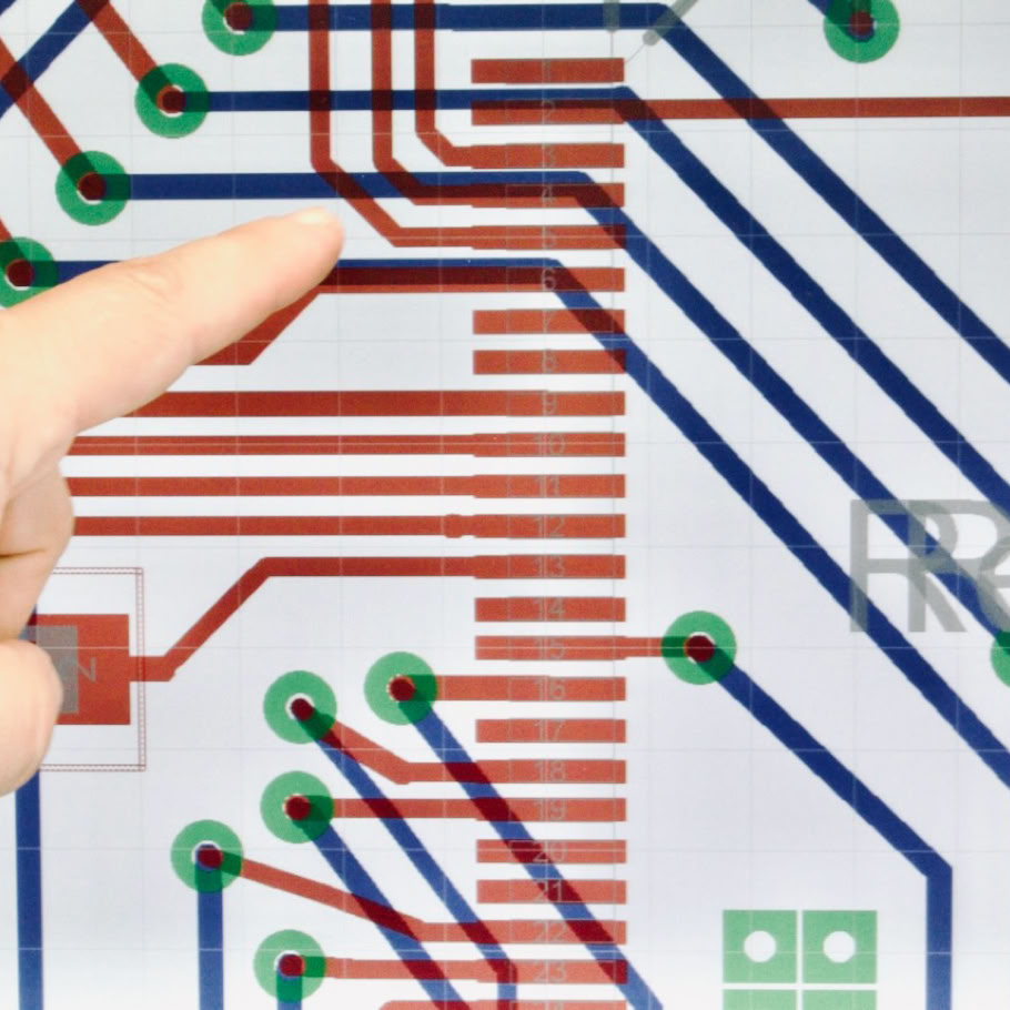 A diverse group of professionals engaged in a collaborative meeting in an office environment.